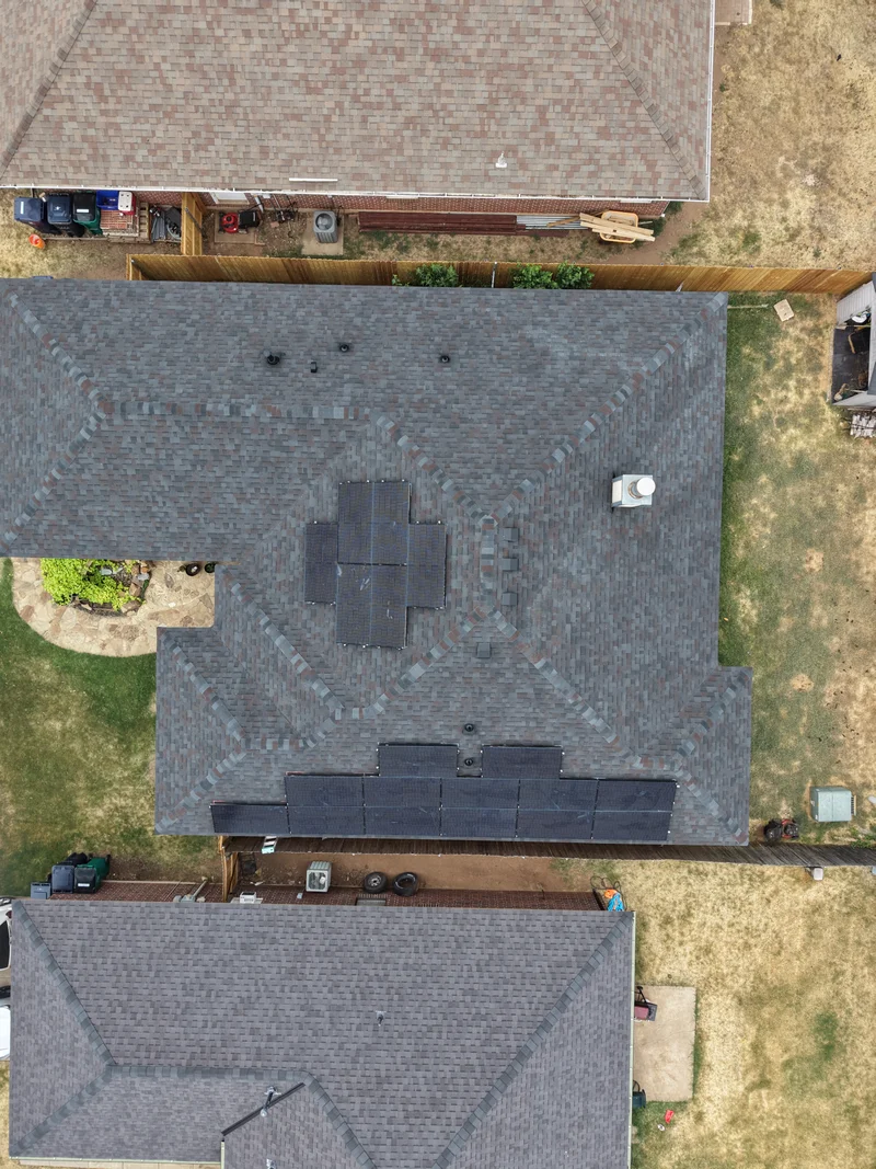 Overhead view of the Yukon home with 19 solar panels mounted on the replacement roof